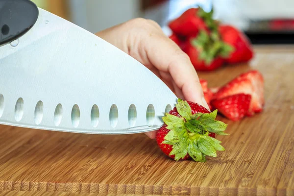 Strawberries being prepared for cooking — Stock Photo, Image