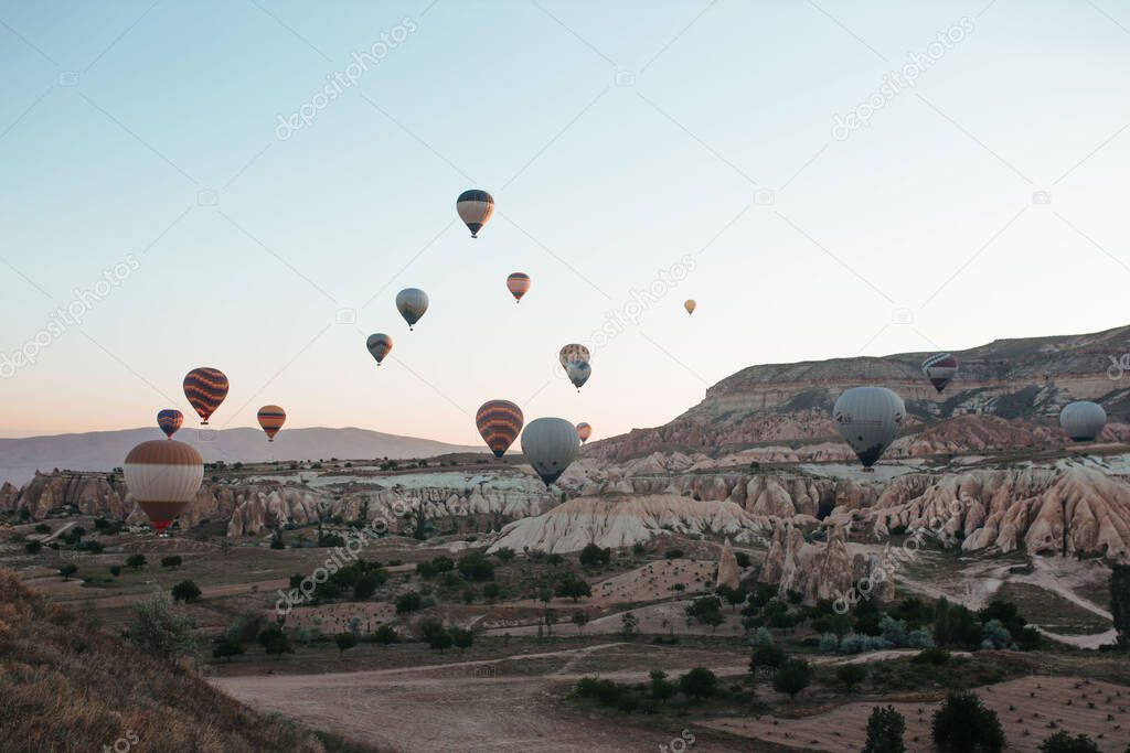 hot air balloon parade in cappadocia at sunrise