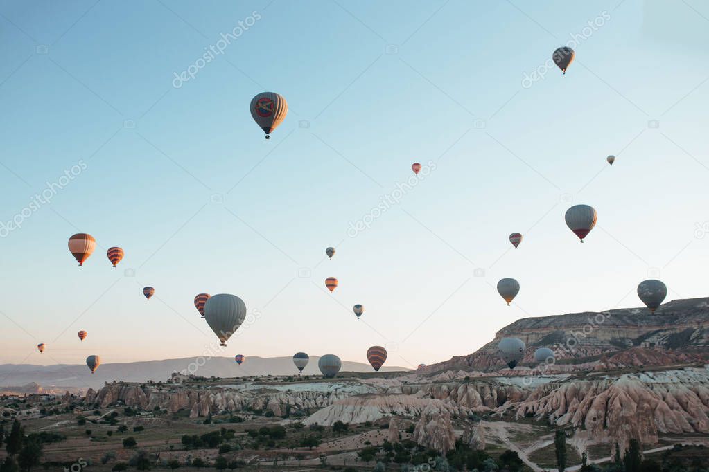 hot air balloon parade in cappadocia at sunrise