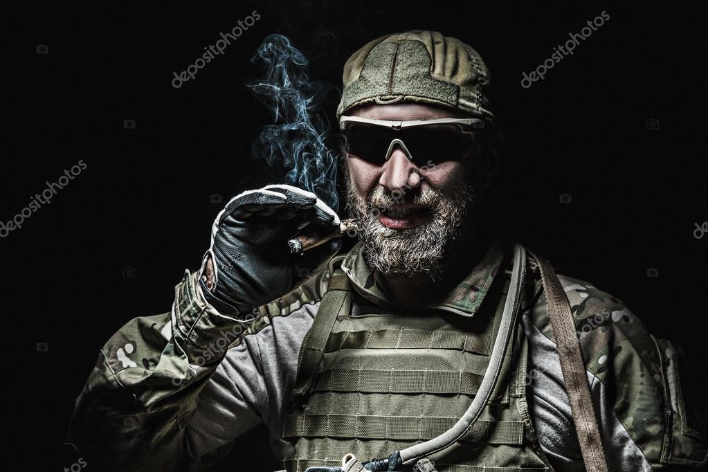 US Army soldier smoking Stock Photo by zabelin 100046892