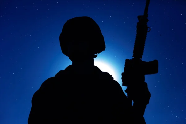 Night silhouette of special operations soldier