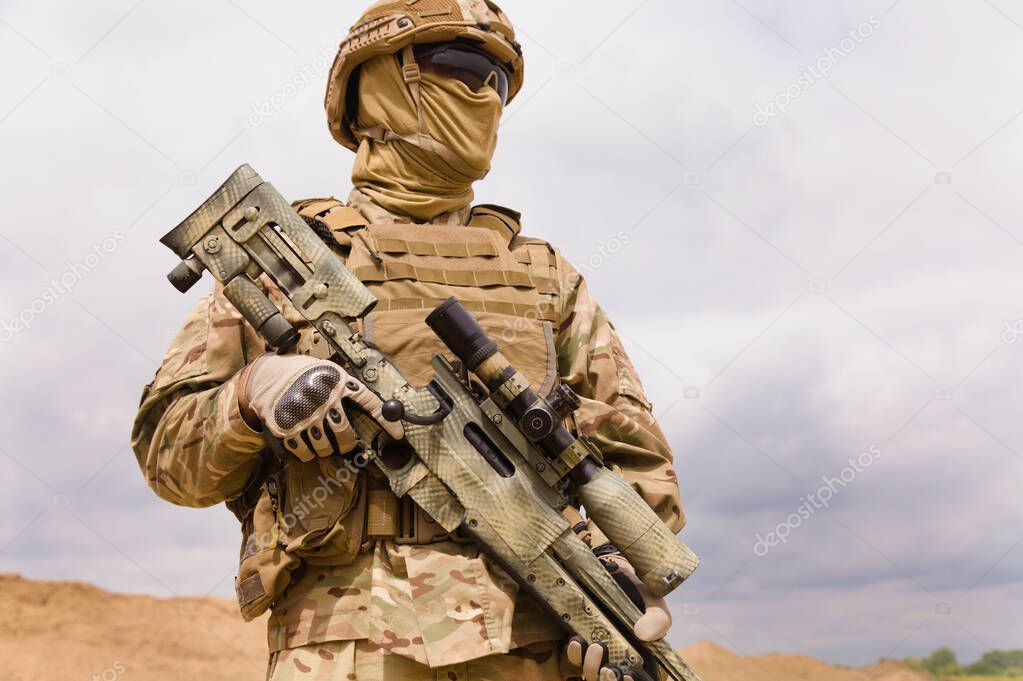 Special forces soldier with rifle close-up