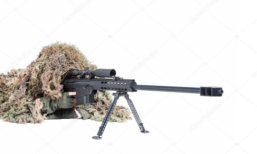 Army sniper wearing a ghillie suit