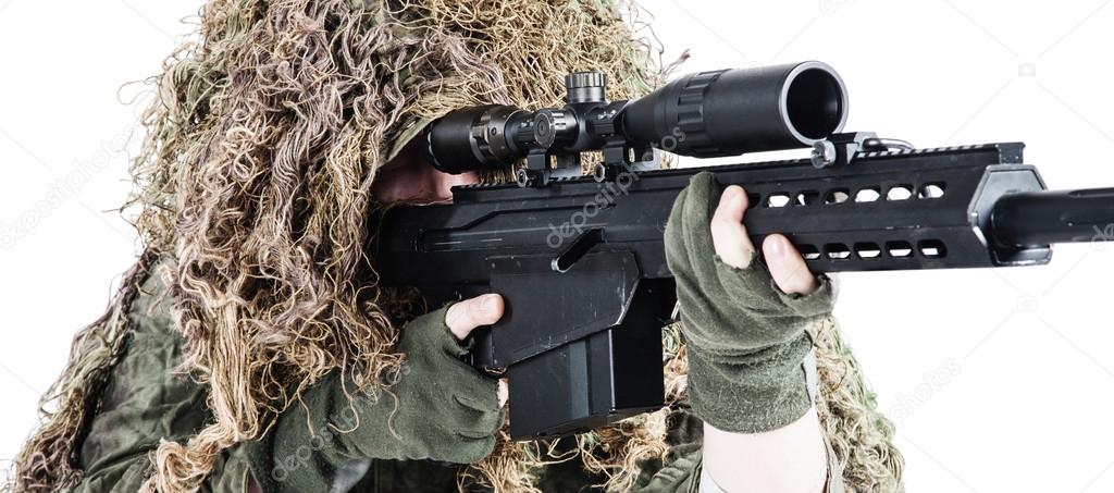 Army sniper wearing a ghillie suit