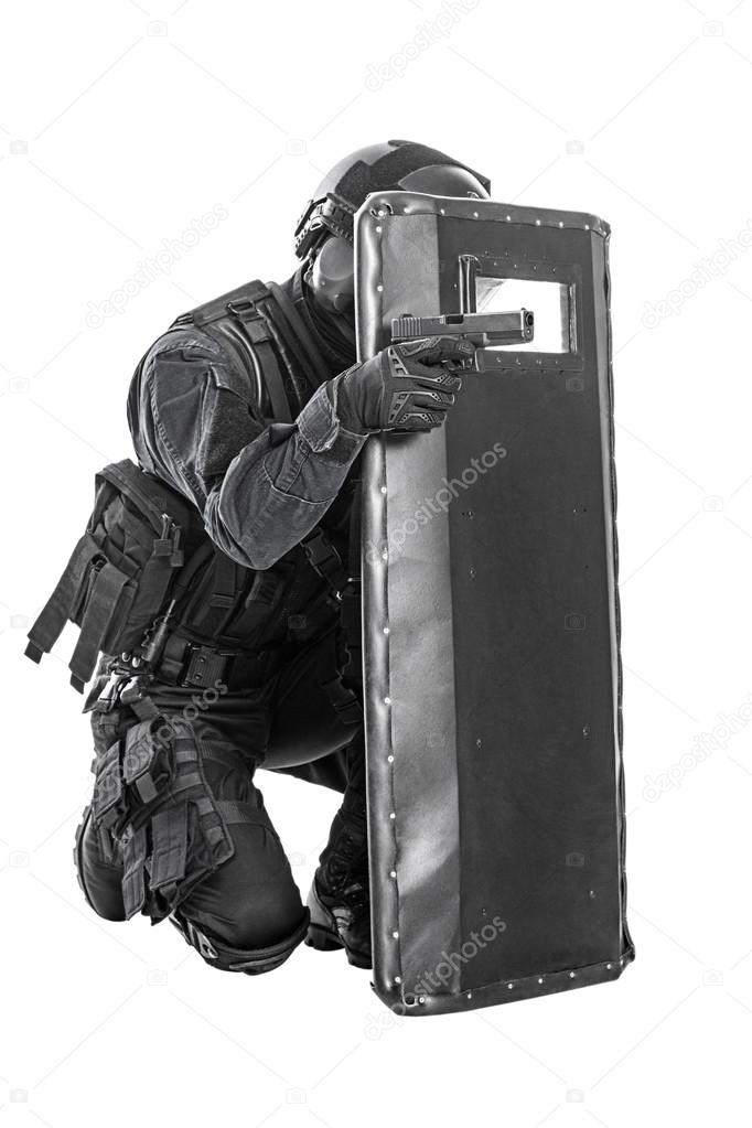 SWAT officer with ballistic shield