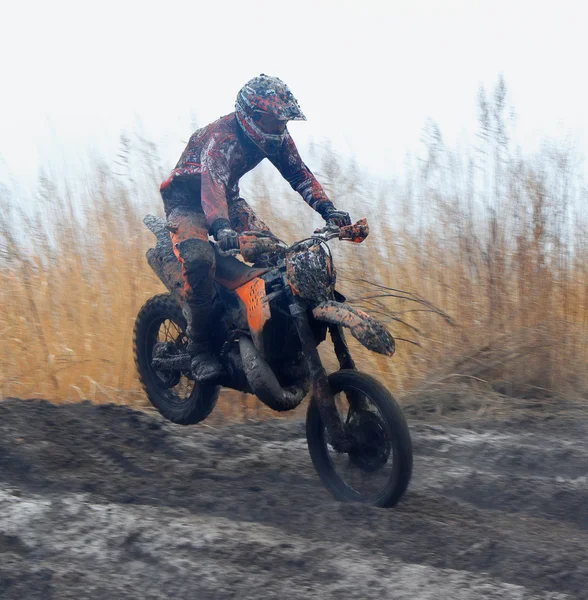 Off-road rider is jumping Stock Photo
