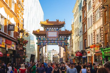 July 1, 2018: Chinatown, an ethnic enclave in the City of Westminster, London, UK.  It contains a number of Chinese restaurants, bakeries, supermarkets, souvenir shops. clipart