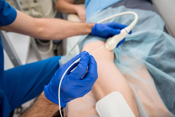 Cardiologist use tubes and ultrasound for radiofrequency catheter ablation. — Stock Photo, Image