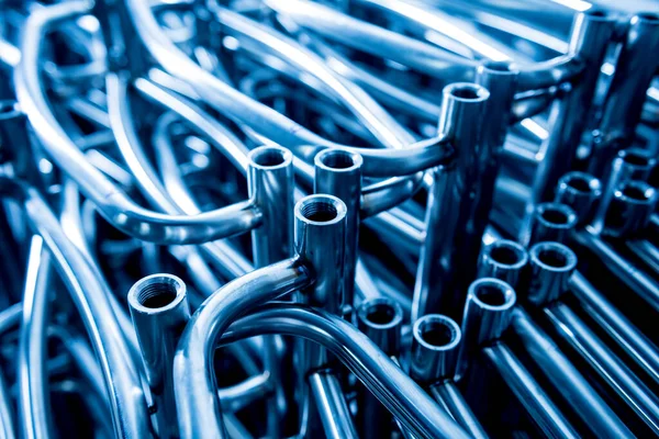 Astratto sfondo industriale di costruzione tubi metallici. — Foto Stock