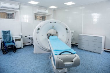 Computer tomography diagnostics in modern medical center clipart