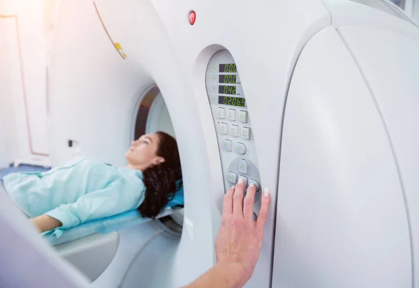 Doctor and patient in the room of computed tomography at hospital — Stock Photo, Image
