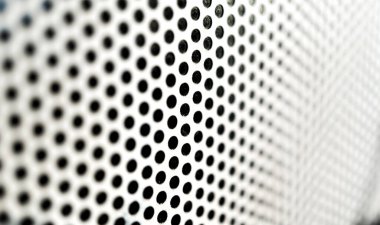 Dairesel delikli metalin arkaplan tabakası