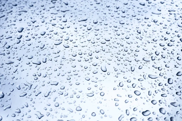 Many different drops of water on the metal surface — Stock Photo, Image