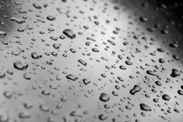 Many different drops of water on the metal surface — Stock Photo, Image