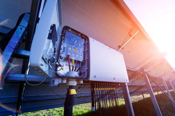 Opened voltage inverter at the back side of solar panel — Stock Photo, Image