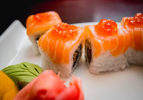 Sushi on white plate — Stock Photo, Image