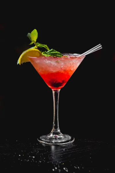 red Cocktail with lemon and mint