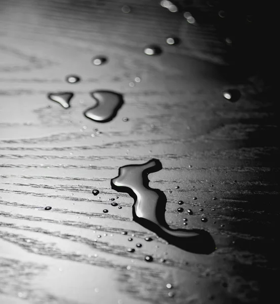 Water drops on black table