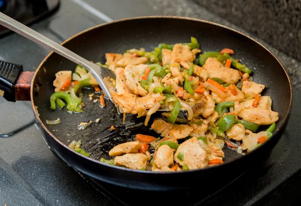 Roasted meat with vegetables on pan — Stock Photo, Image