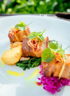 Pieces of meat with vegetables