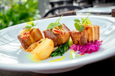 Pieces of meat with vegetables