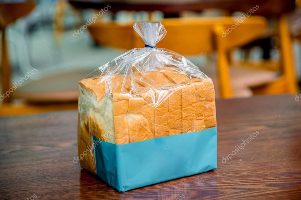 Sliced bread in cellophane bags Stock Photo by Romaset 97375960