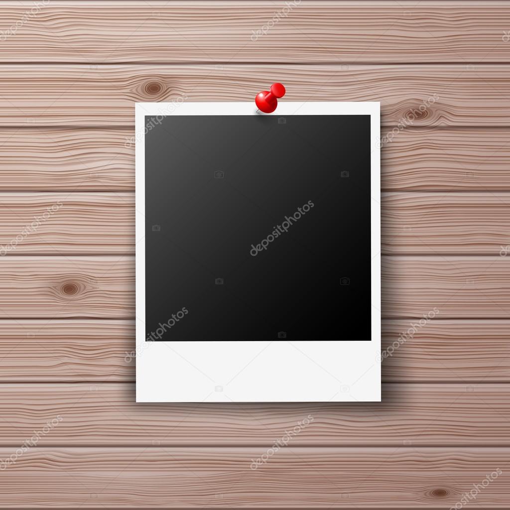 Retro Photo Frame Pinned with Red Pin on Wooden Wall