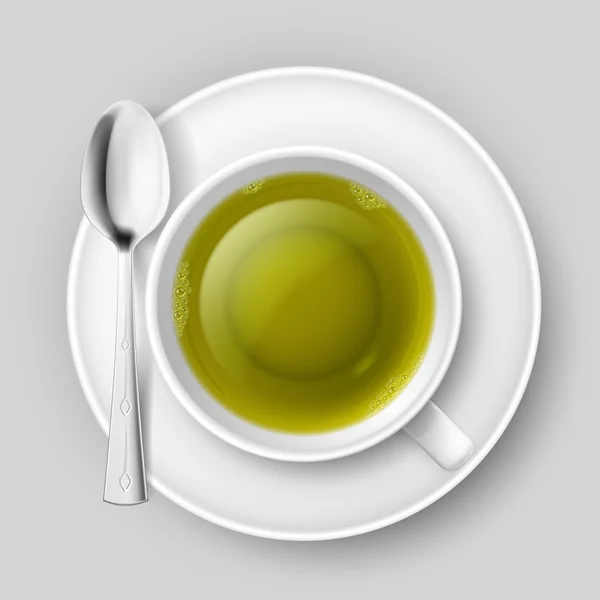 Taza de té verde con cuchara sobre fondo gris — Vector de stock