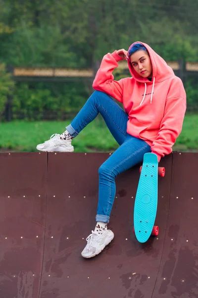 Portrait Trendy Pretty Young Girl Dressed Pink Hoodie Jeans Sitting — Stock Photo, Image