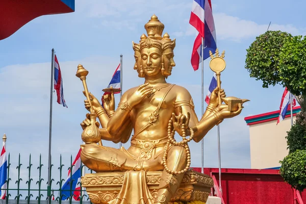 Golden Brahma statue. — Stock Photo, Image
