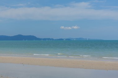 Sailboats on the horizon