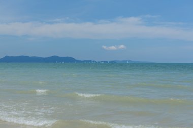 Sailboats on the horizon