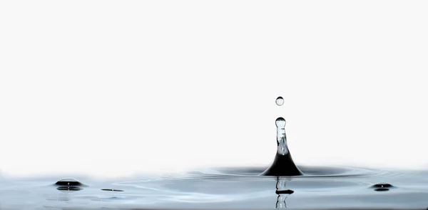 Water drop and splash — Stock Photo, Image