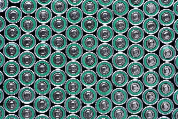 Groep van alkaline batterijen als achtergrond — Stockfoto