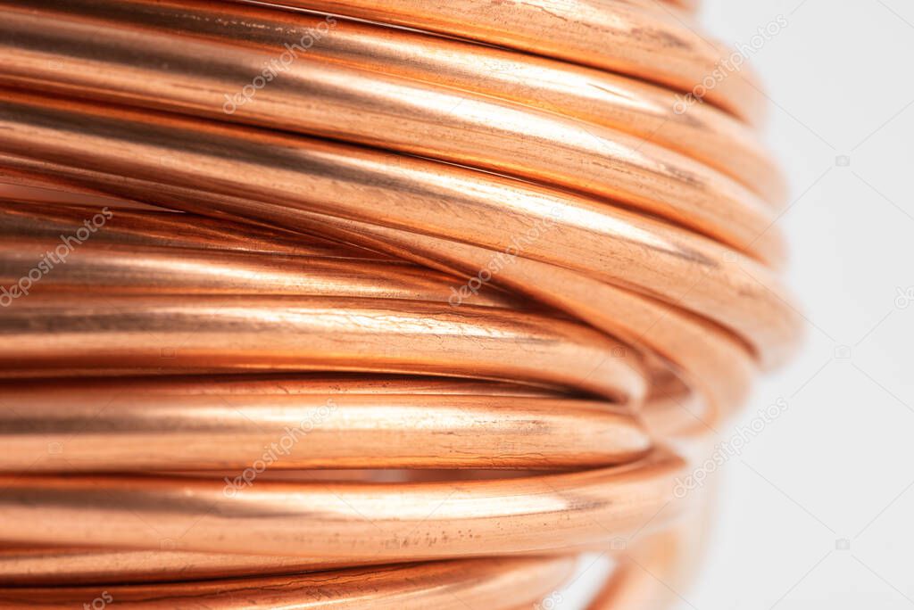 Close-up rolled up copper wire with blurred background