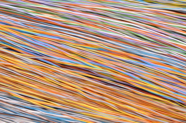 Colored wires in the global telecommunications networks — Stock Photo, Image