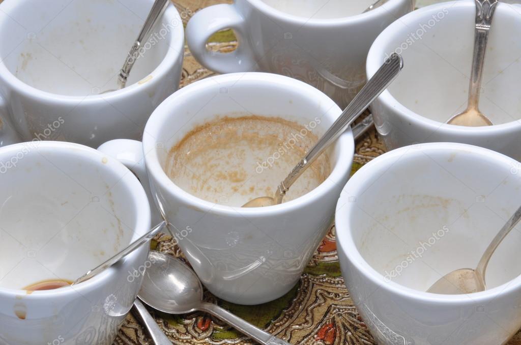 Dirty cups and spoons after coffee — Stock Photo © Zetor2010 59886679