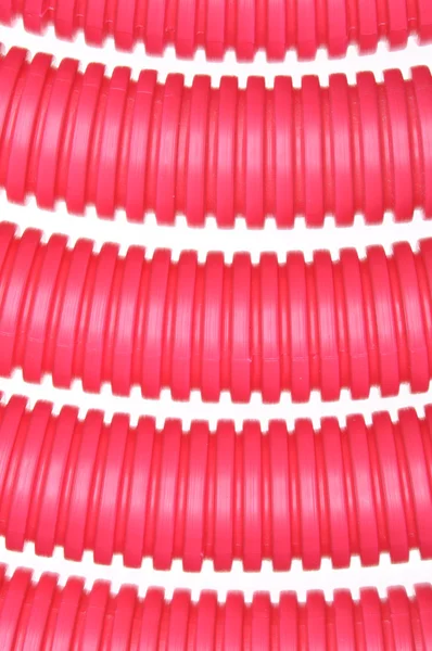 Tubo corrugado de plástico rojo —  Fotos de Stock
