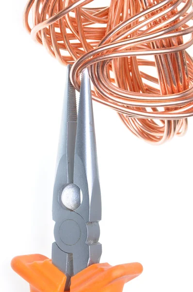 Pliers with copper wire — Stock Photo, Image