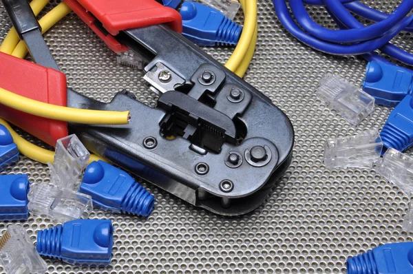 Crimping tool with network cable and connectors — Stock Photo, Image