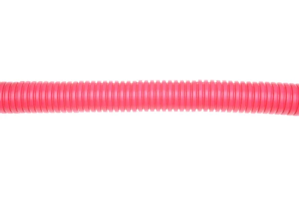 Red plastic corrugated pipe — Stock Photo, Image