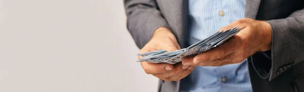 Close up of businessman hands, they are counting money. — Stock Photo, Image