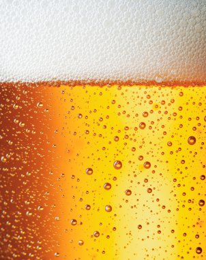 Close up drops of a Ice Cold Pint of Bee