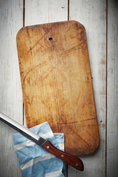 Wooden Board with knife and napkin Stock Obrázky