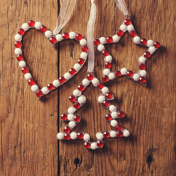 Christmas decorations on wooden background — Stock Photo, Image