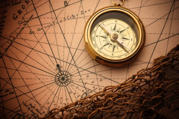 Compass on vintage map — Stock Photo, Image