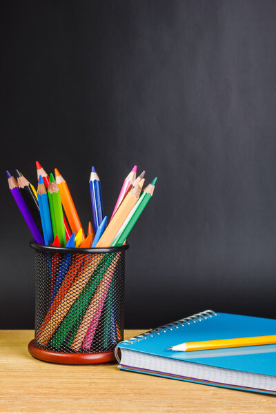 Teacher's desk with a color pencils