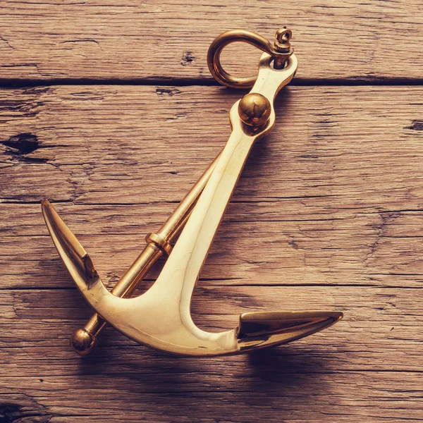 Anchor on wood background — Stock Photo, Image