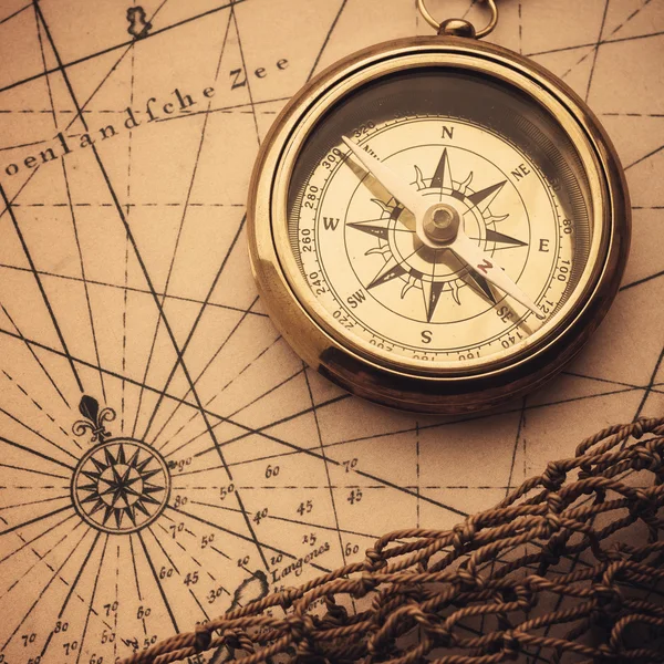 Compass on vintage map — Stock Photo, Image