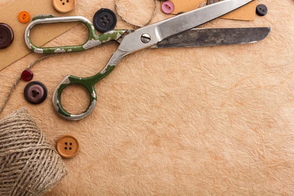 Old scissors and buttons — Stock Photo, Image